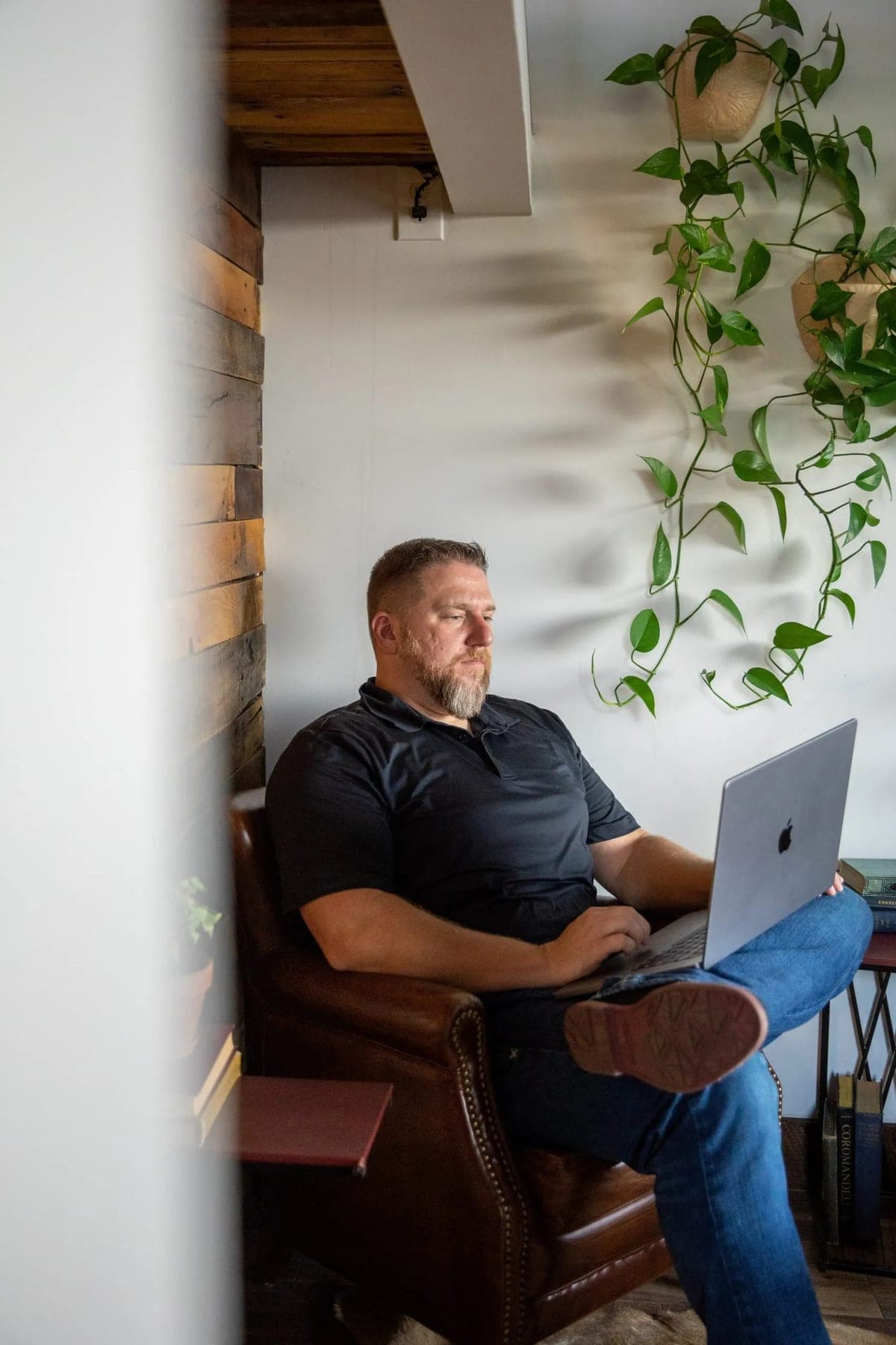 Christopher M. White working on a laptop